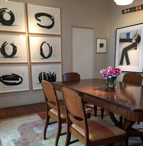 Dining Room: Joel Shapiro’s <i>Jazz</i>, and a series of sculpture studies by Bernar Venet are the perfect complement to each other in the dining room.